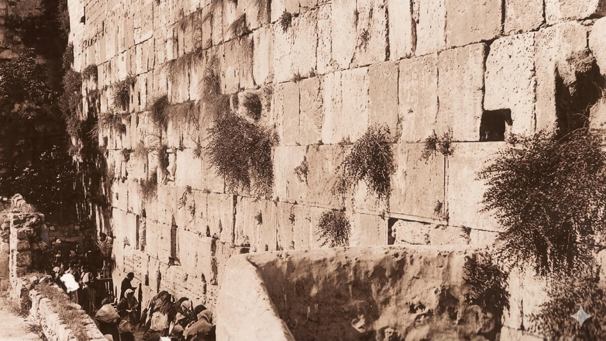 The Western Wall (PikiWiki). Photographed in the 1870s by 19th-century French photographer Félix Bonfils. In the 19th century, Jews were required to pay the Ottoman authorities for the right to pray and lament at the Kotel. The American consul Albert Rhodes reported that the annual payment amounted to $1,500. Moses Montefiore purchased the right in perpetuity.