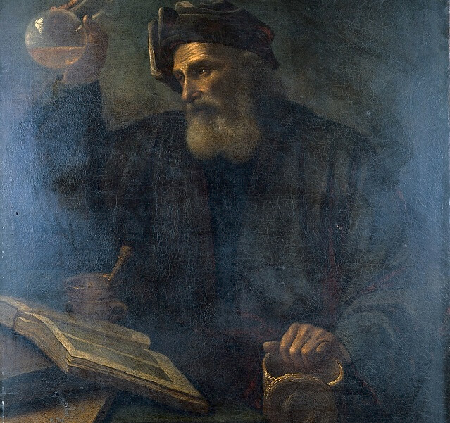 A_physician_examining_a_urine_flask